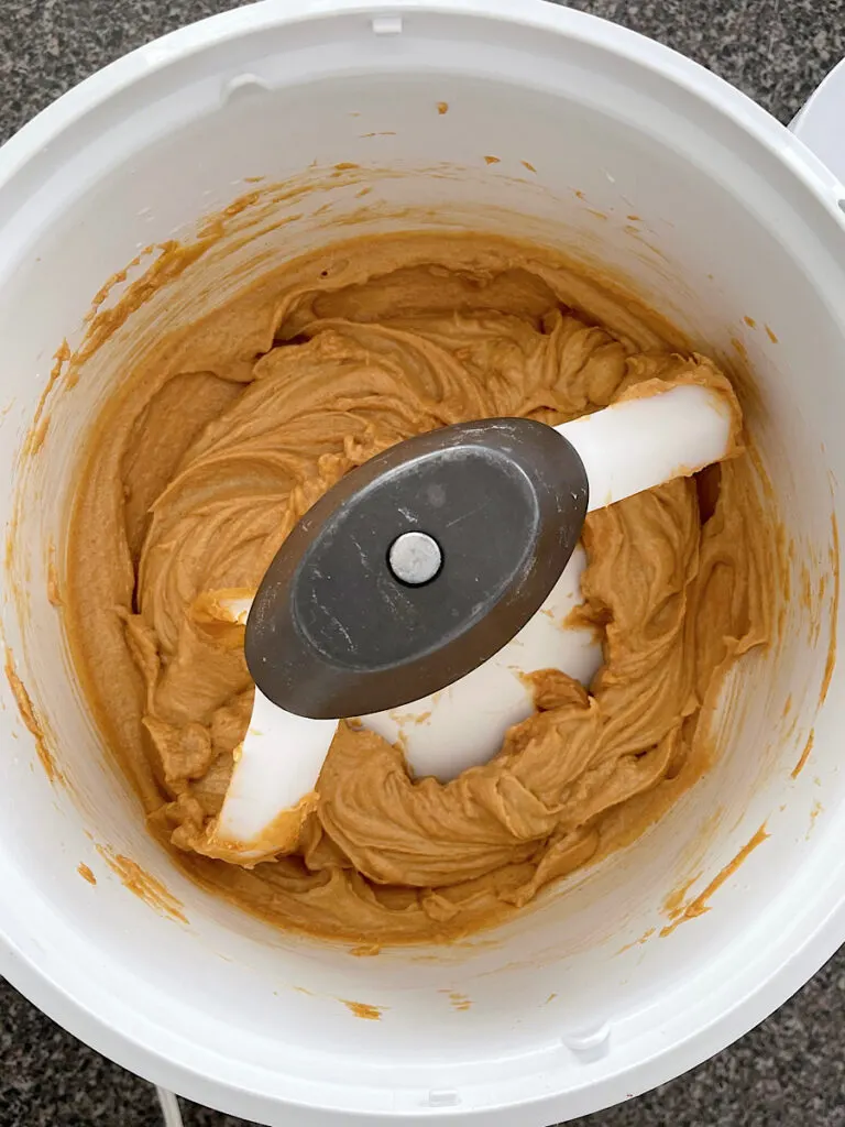 Peanut Butter, butter, sugar, and brown sugar in a stand mixer.