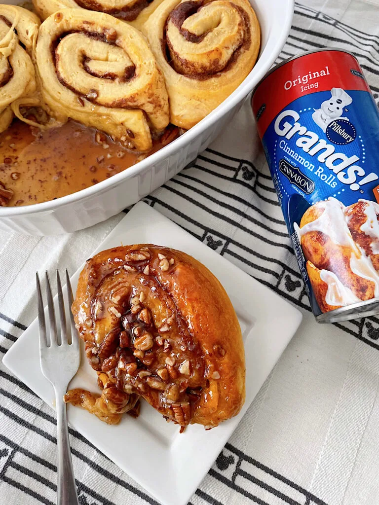 Caramel Pecan Sticky Buns and a container of Pillsbury cinnamon rolls.
