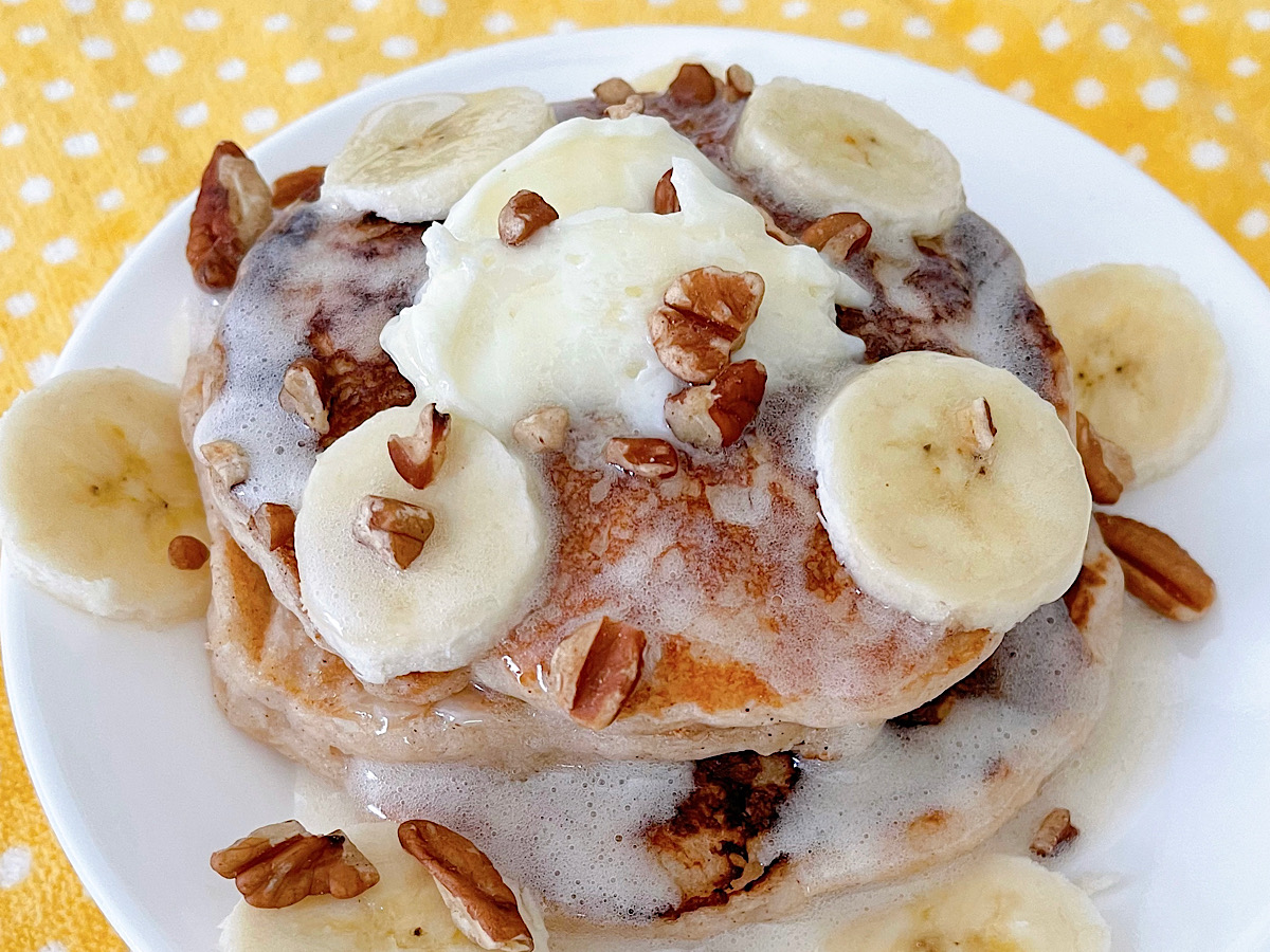 A plate of banana pancakes made with pancake mix.