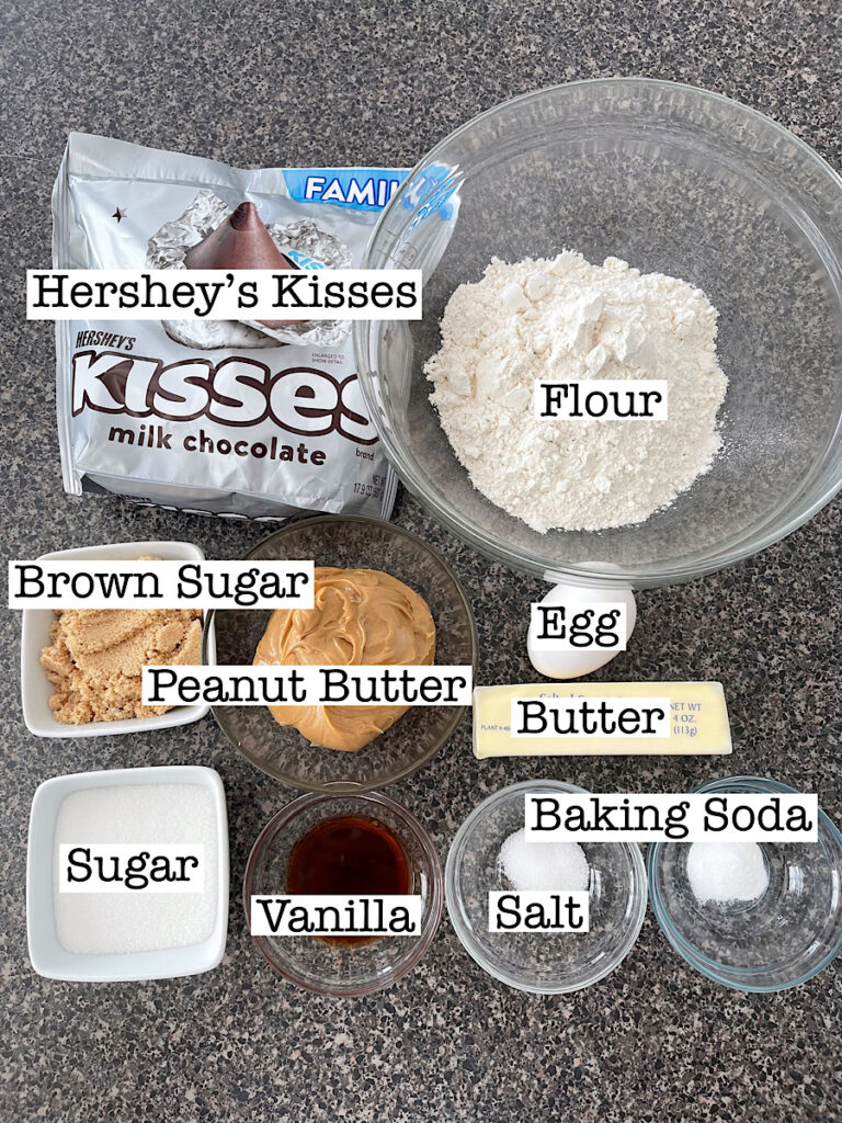 Ingredients to make peanut butter Hershey's Kiss cookies.