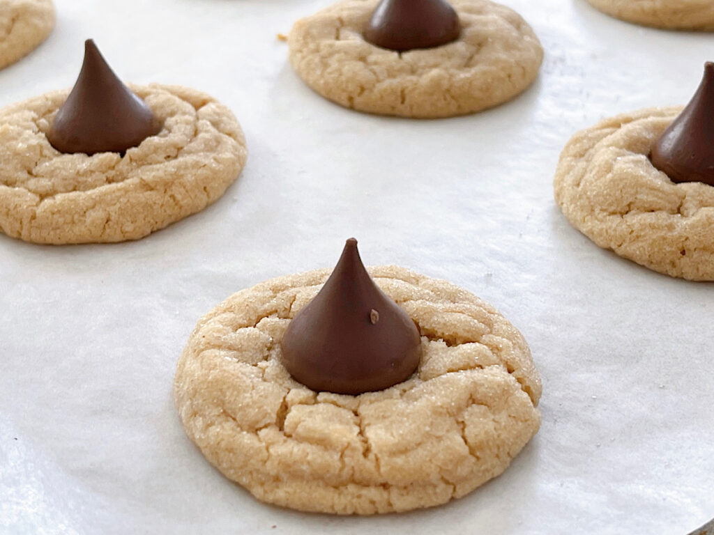 A peanut butter cookie with a Hershey's kiss.