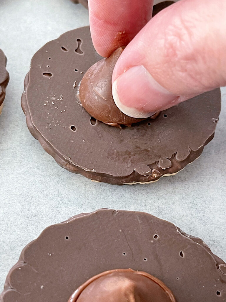 A Hershey kiss added to a fudge stripe cookie to make witch's hats.