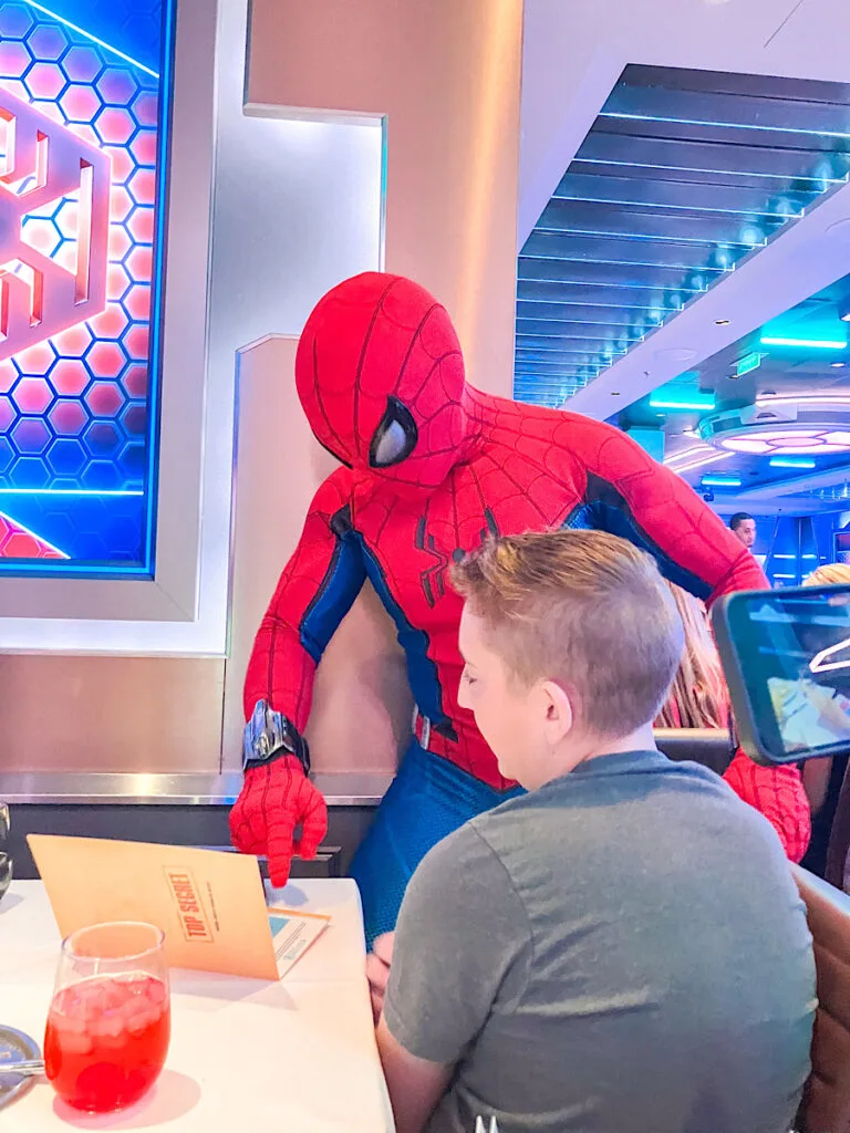 Spider-Man at Worlds of Marvel restaurant on the Disney Wish.