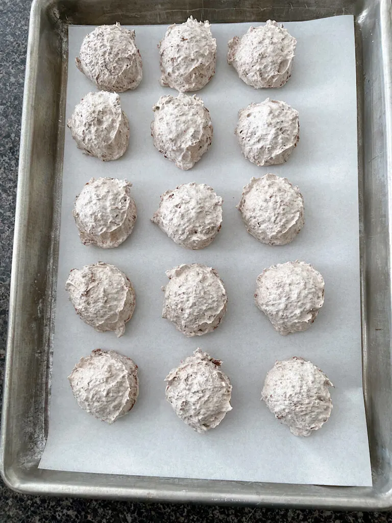 Cool Whip Candy truffles on a baking sheet ready to freeze.