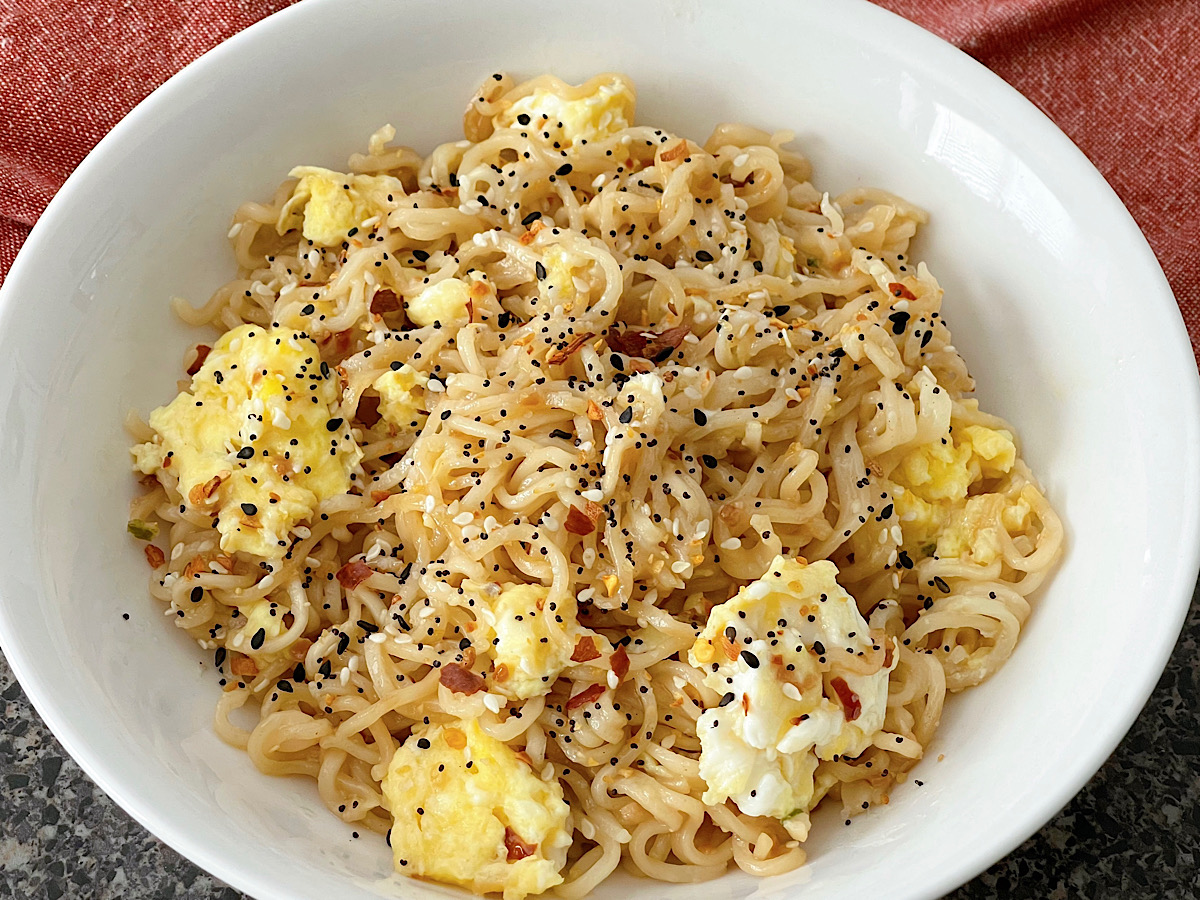 A bowl of TikTok Ramen noodles with egg, brown sugar, garlic, butter, and bagel seasoning.