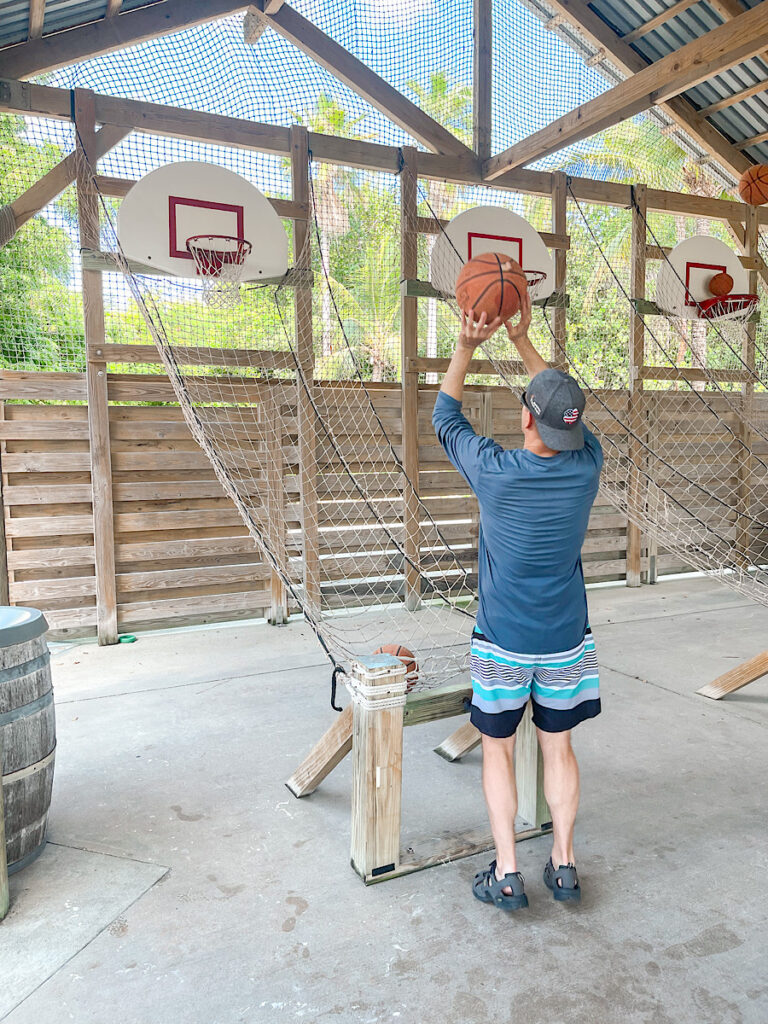 A guy competing in the free throw competition on Castaway Cay.