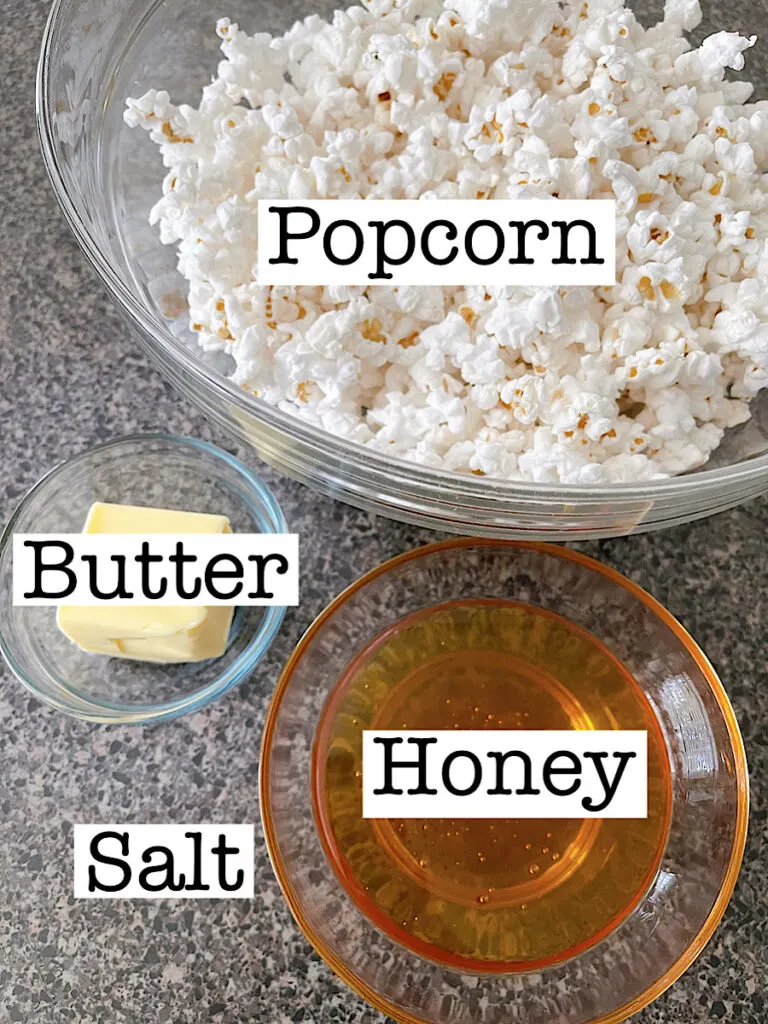 Ingredients for a honey popcorn recipe.