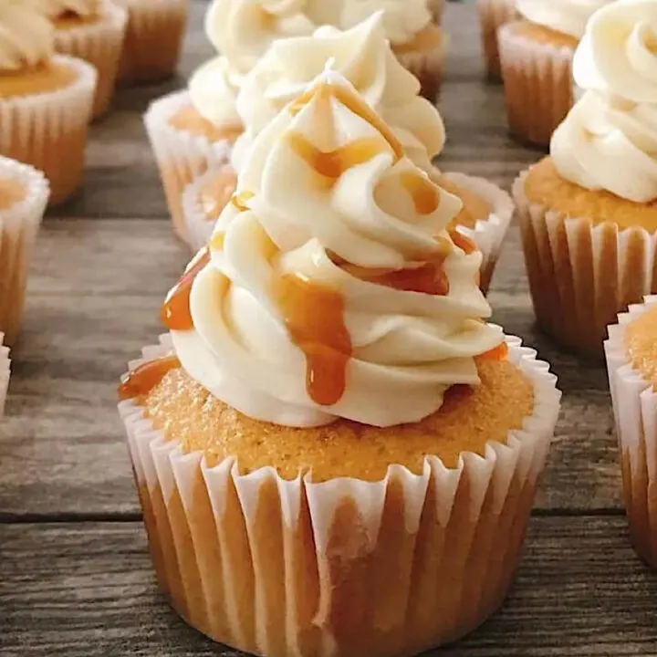 Butterbeer cupcakes drizzled with caramel.