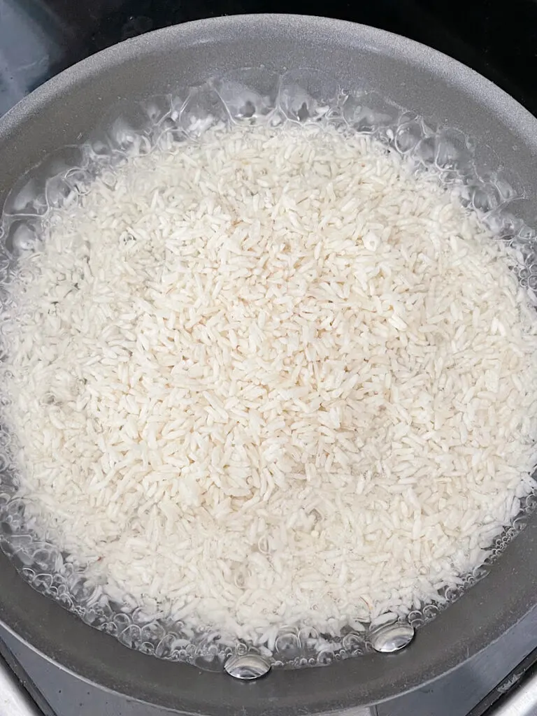Minute rice in boiling water.