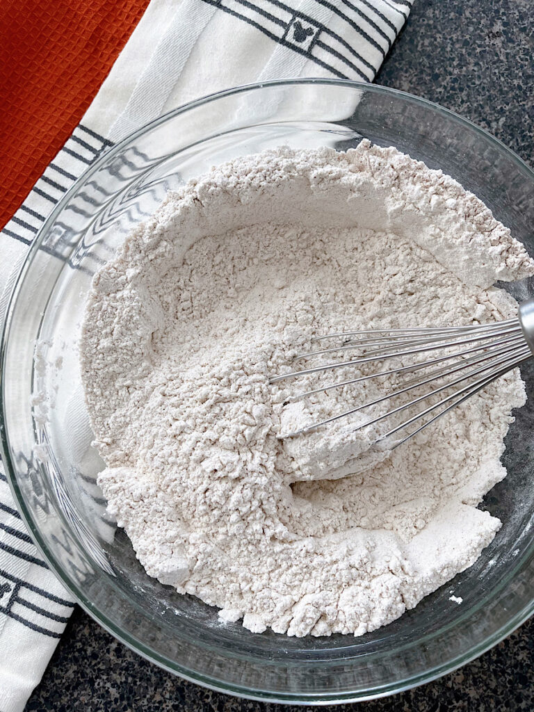 Dry ingredients in a bowl to make pumpkin snickerdoodles.