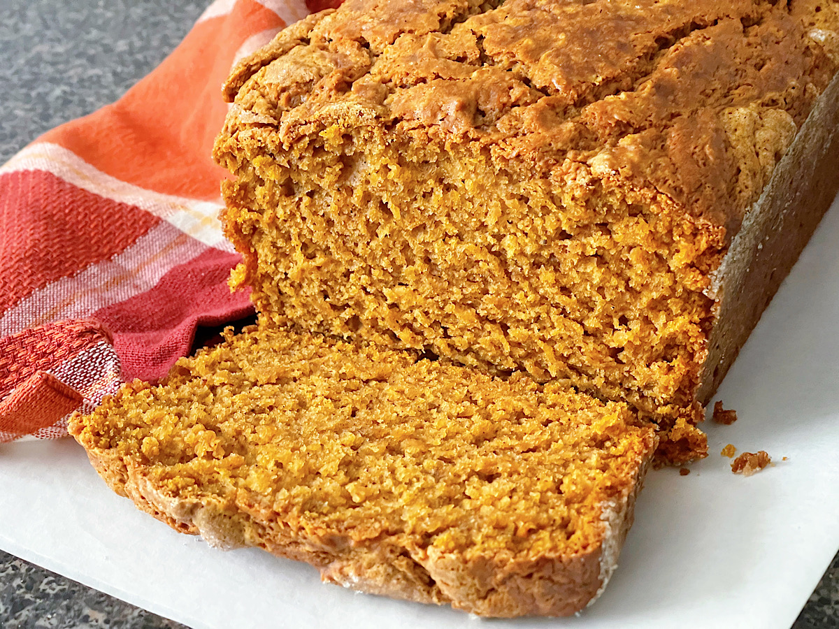 Moist pumpkin bread cut into slices.