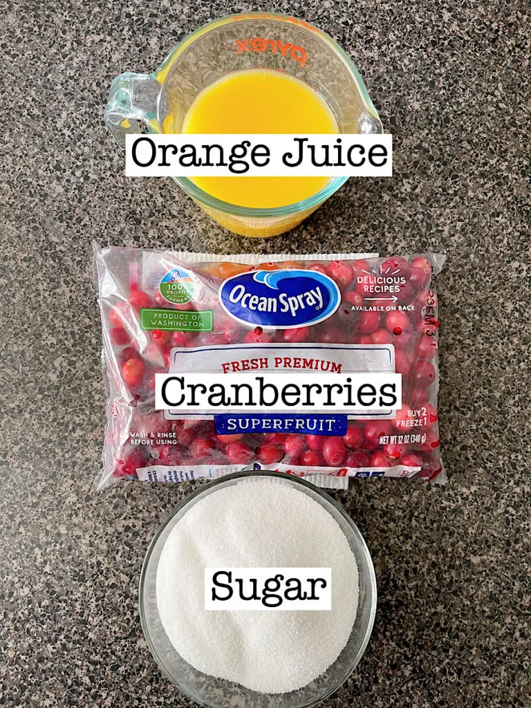 Three ingredients to make homemade cranberry juice with orange juice.