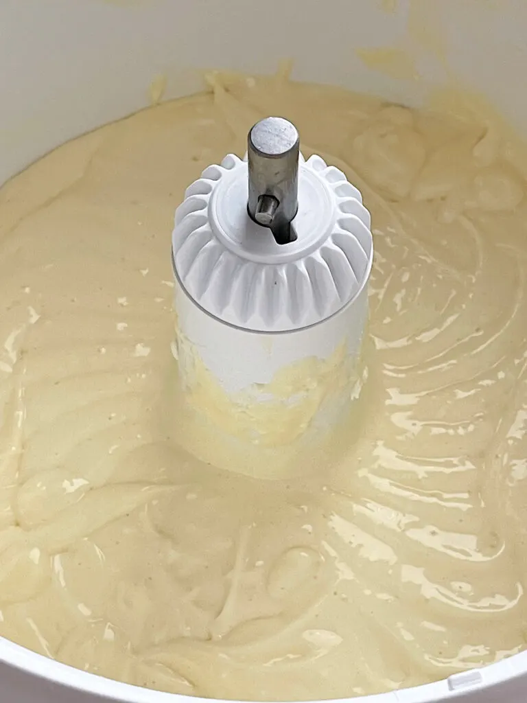Cheesecake batter in a mixing bowl.