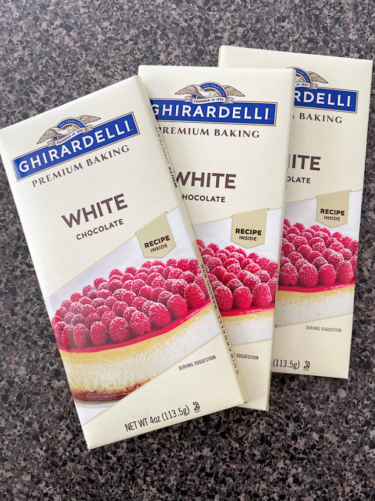 Three bars of Ghirardelli White Chocolate.