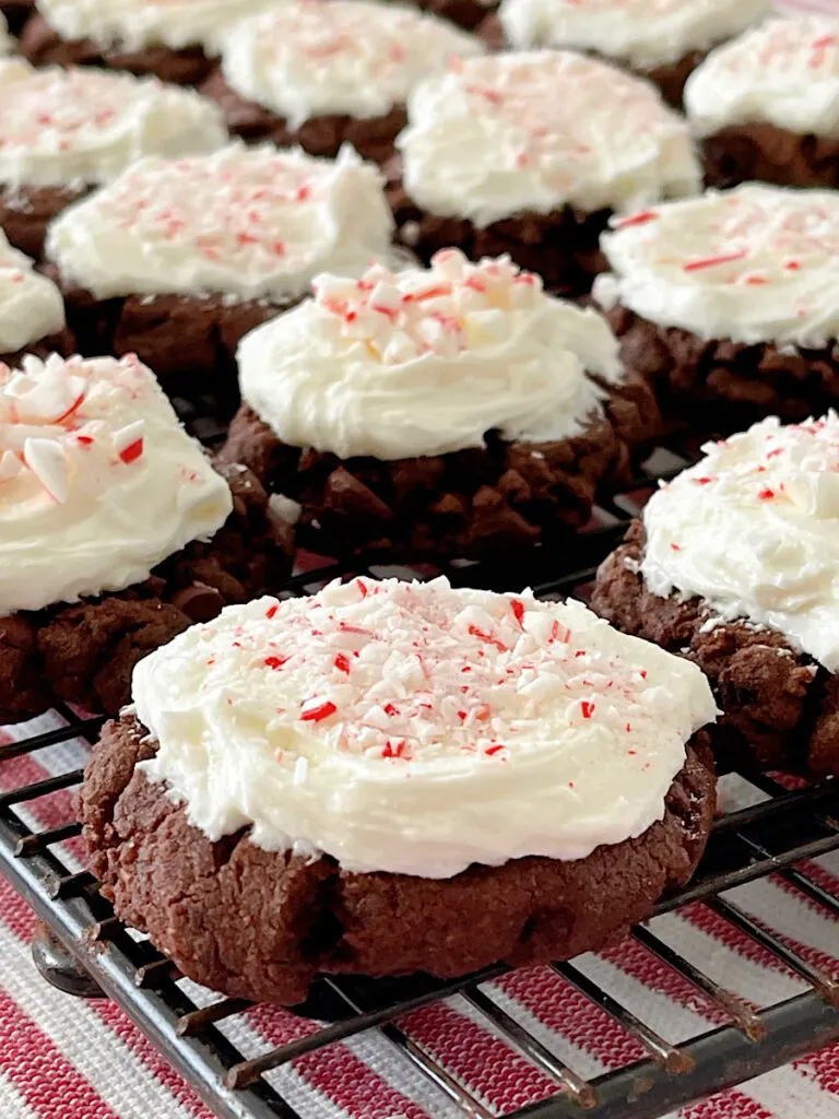 Chocolate peppermint brownie cookies on a cooling rack.