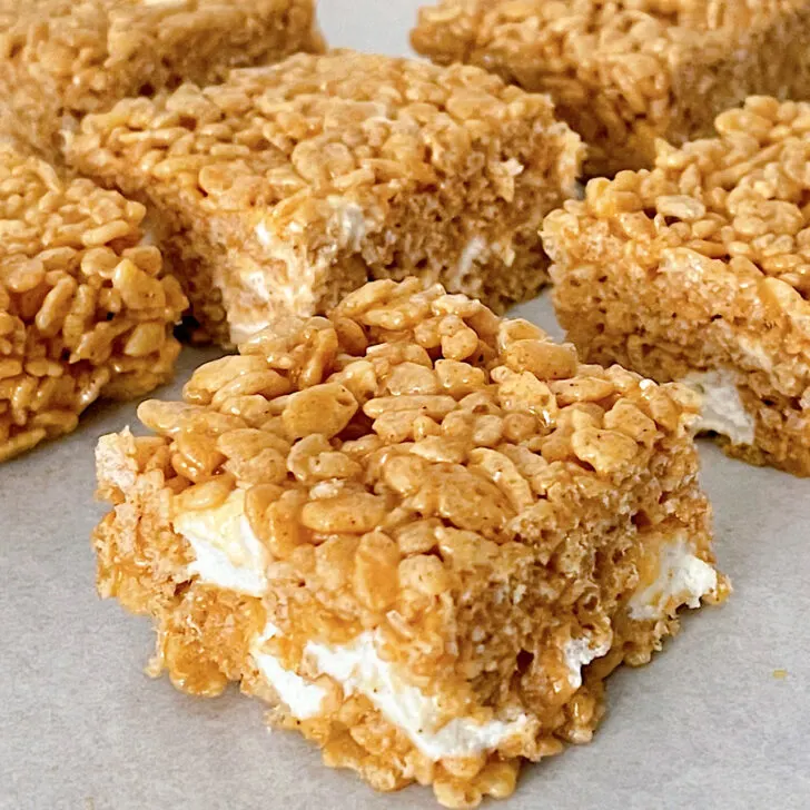 Gingerbread rice krispie treats cut into squares.