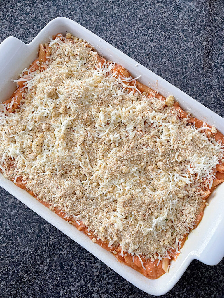 Copycat Olive Garden five cheese baked ziti in a baking dish.