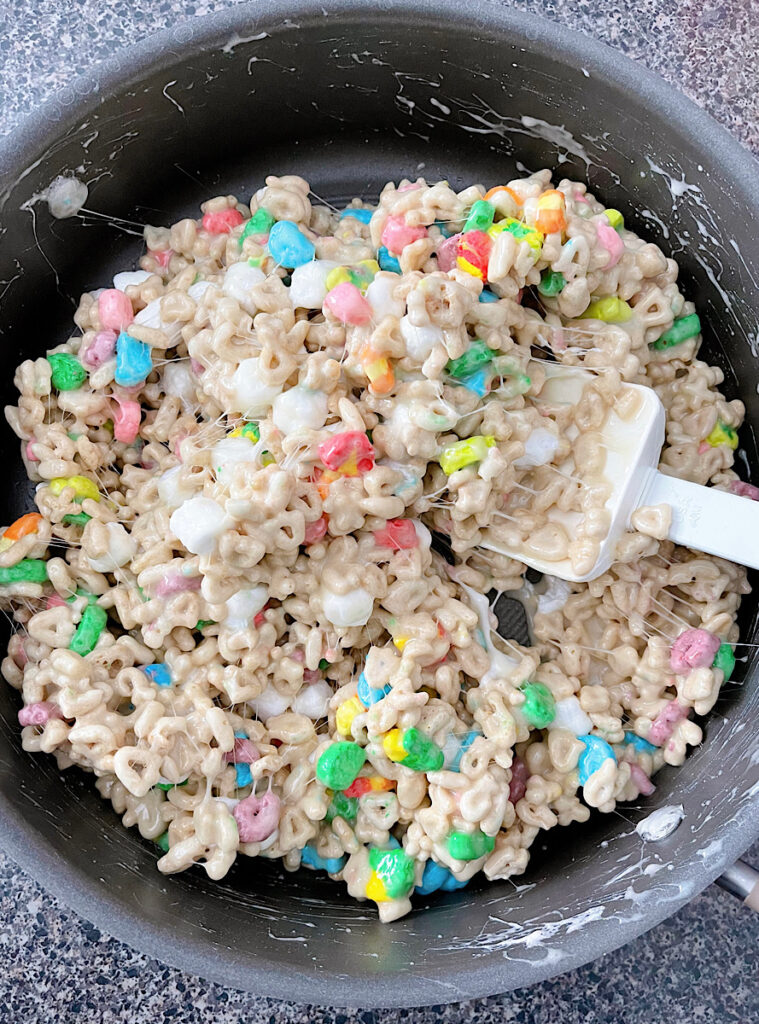 Lucky Charms marshmallow treats in a skillet.