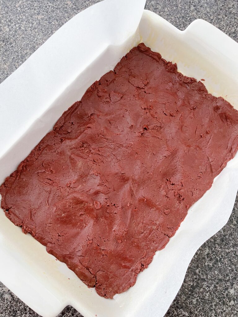 Red velvet butter crust for ooey gooey bars.