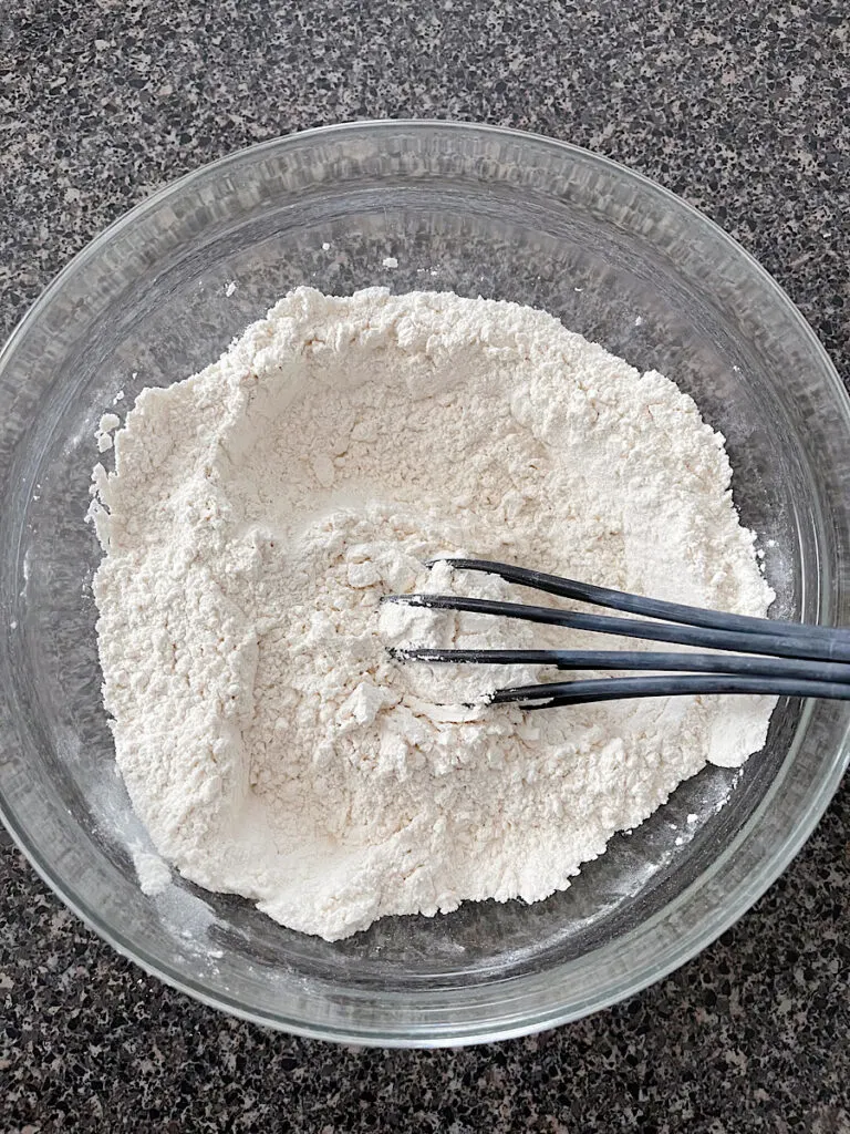 Flour, corn starch, baking powder, and salt in a mixing bowl.