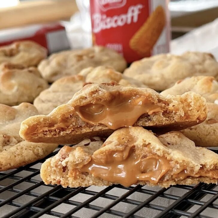 Biscoff cookie butter stuffed cookies on a cooling rack.