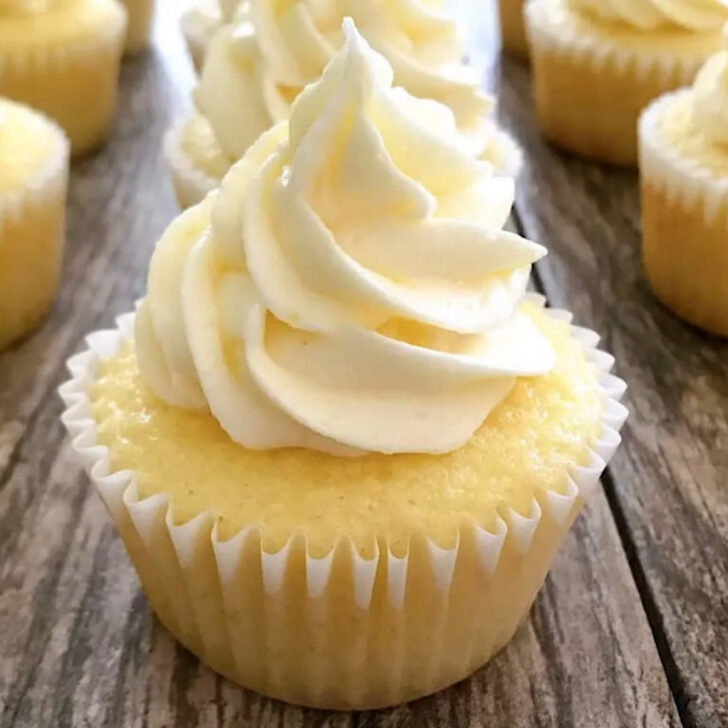 A pineapple cupcake with pineapple frosting.