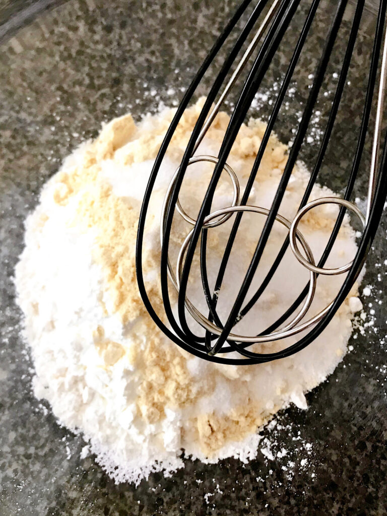 In a large bowl, whisk the pancake mix, corn starch, malted milk, and sugar together.