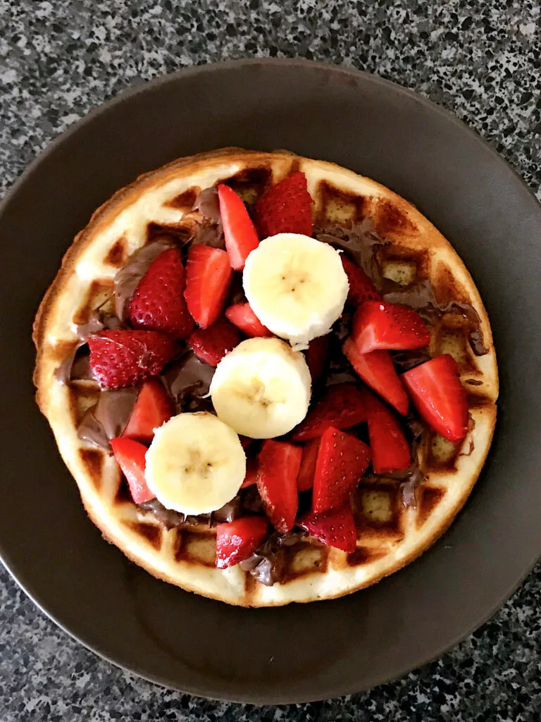 A homemade Disney Fruit Waffle Sandwich with Nutella