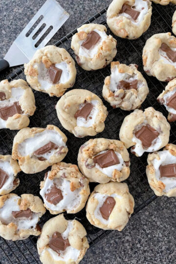 S'mores chocolate chip cookies on cooling rack.