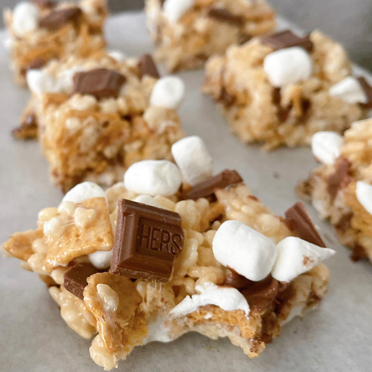 S'mores Rice Krispies treats on parchment paper.