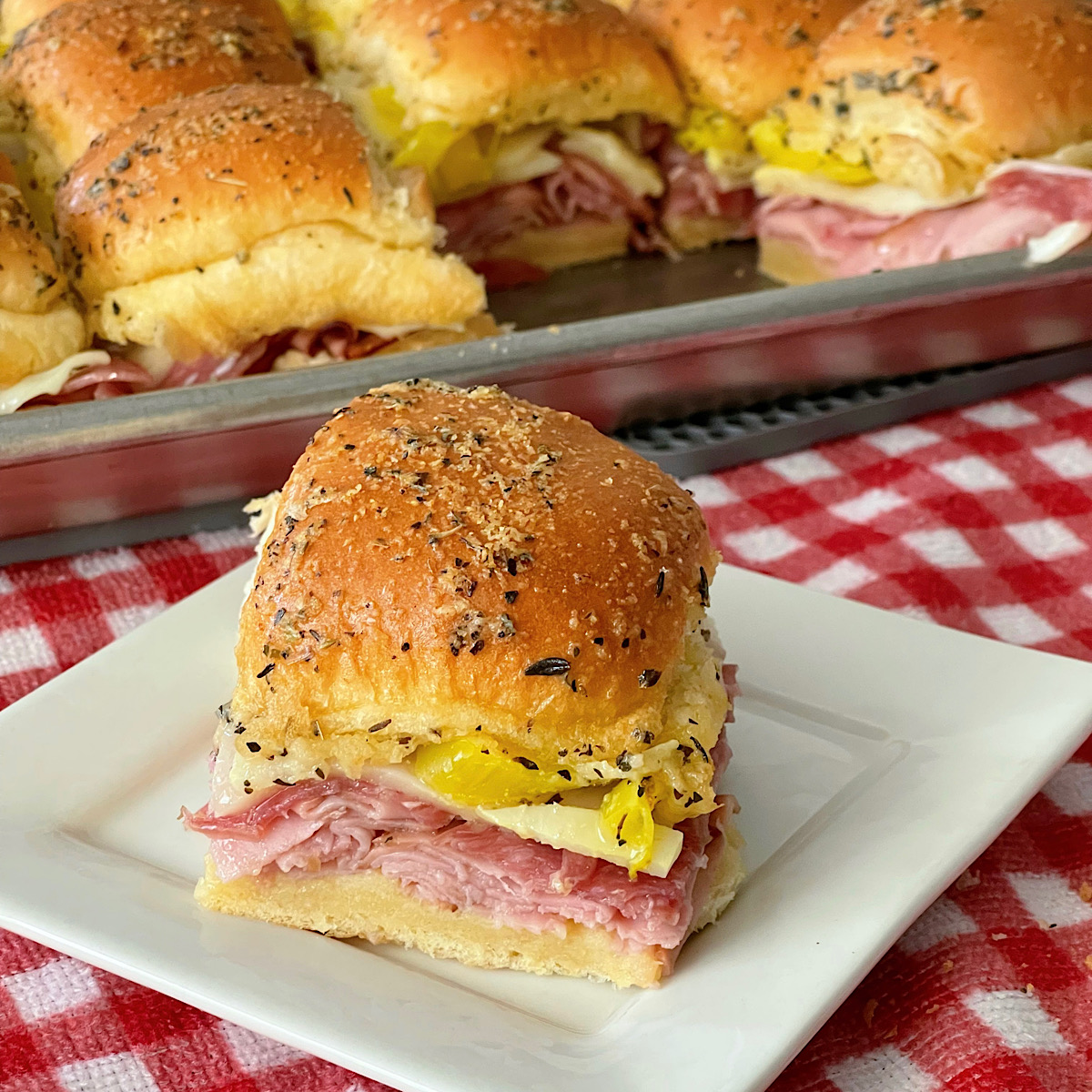 Homemade Italian Sliders on a baking sheet.