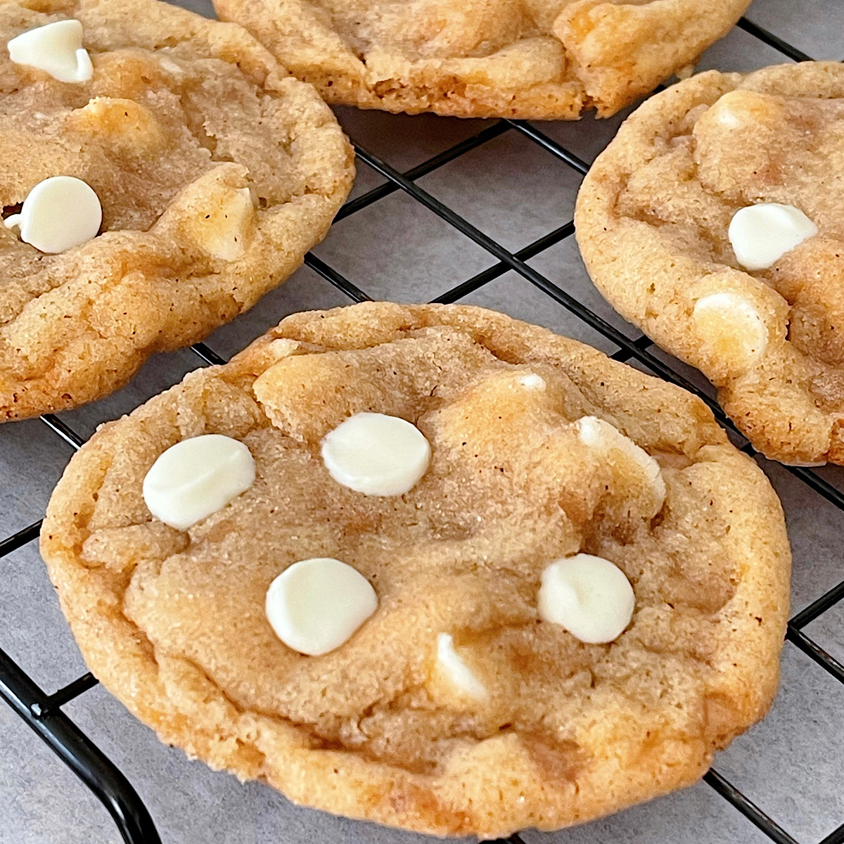 Churro toffee cookies on a cooling rack.