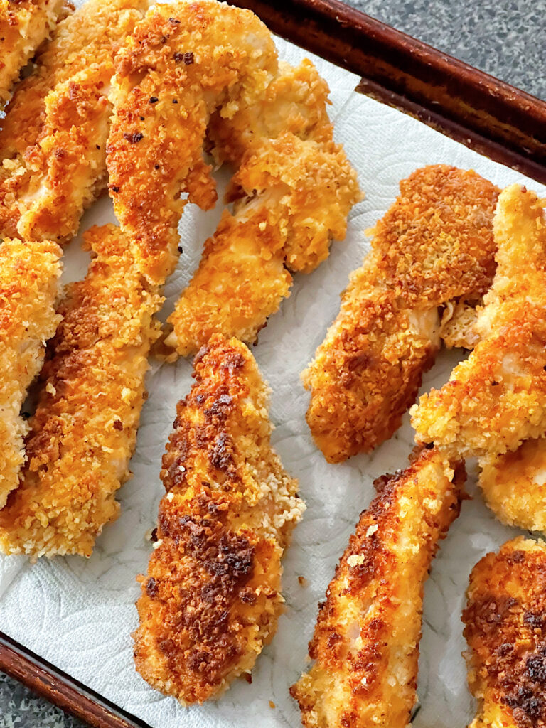 Freshly cooked chicken tenders.