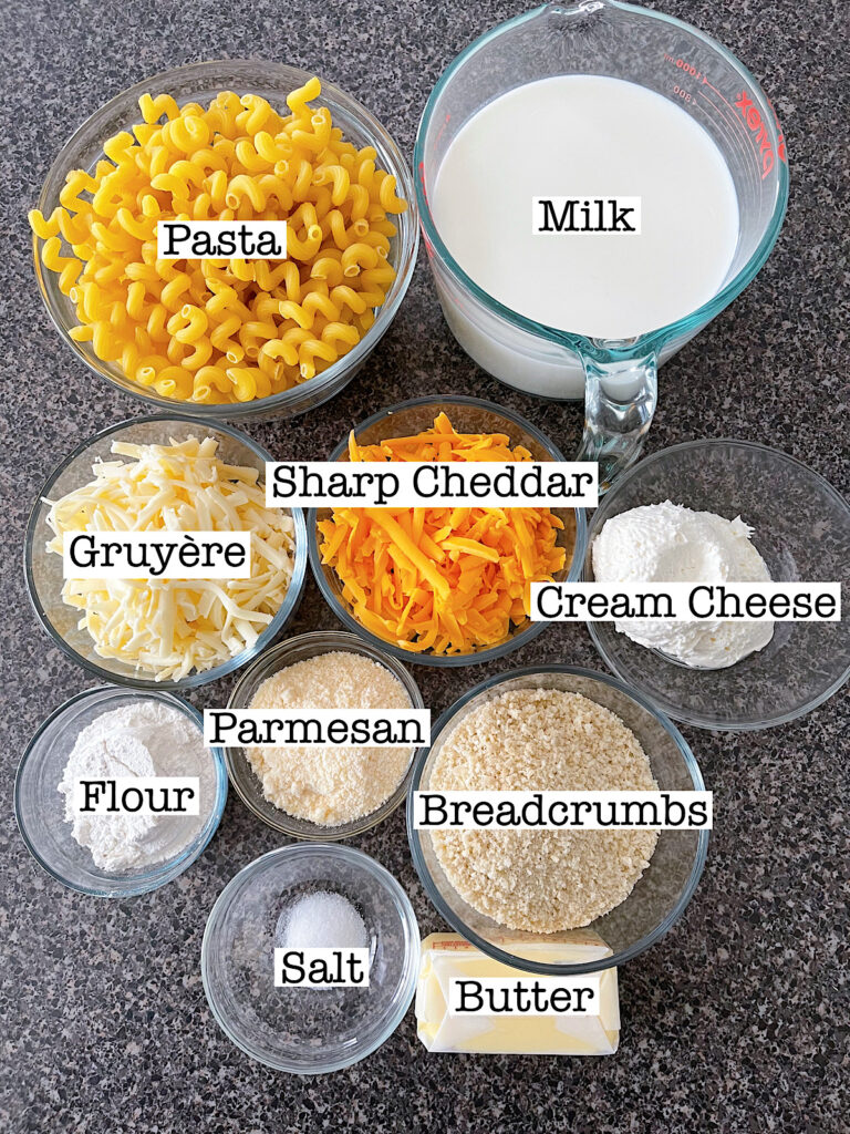 Ingredients to make four cheese baked macaroni and cheese.