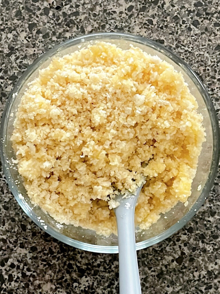 Breadcrumbs mixed with grated parmesan and melted butter.