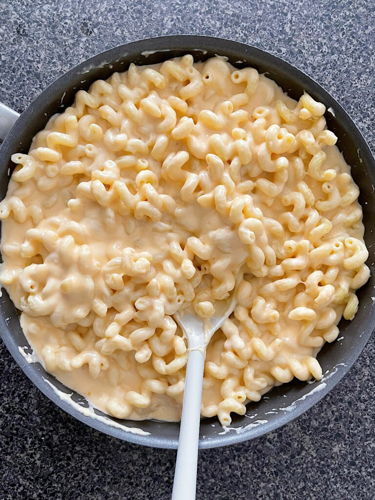 Four cheese mac and cheese in a large skillet.
