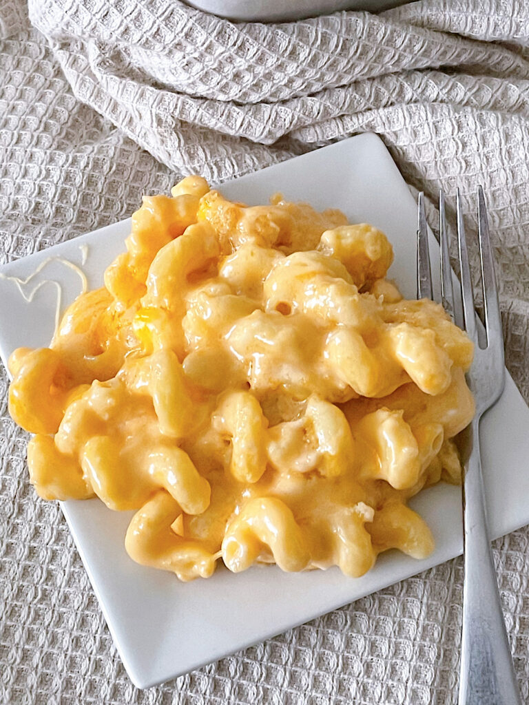A plate full of homemade macaroni and cheese.