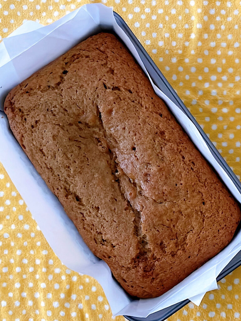 A loaf of banana bread made with sourdough discard.