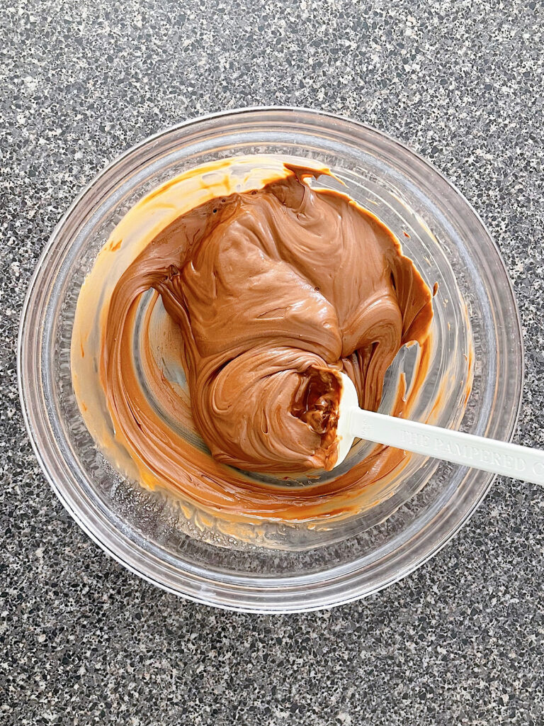 Melted chocolate, peanut butter, and butter.