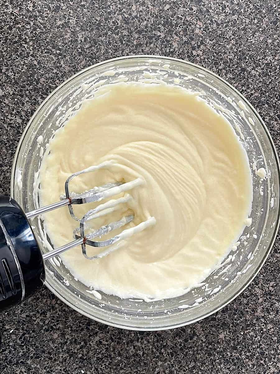 Banana bread batter in a mixing bowl.