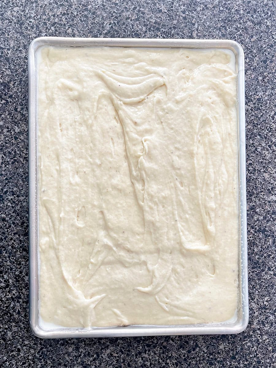 Banana bread batter in a sheet pan.