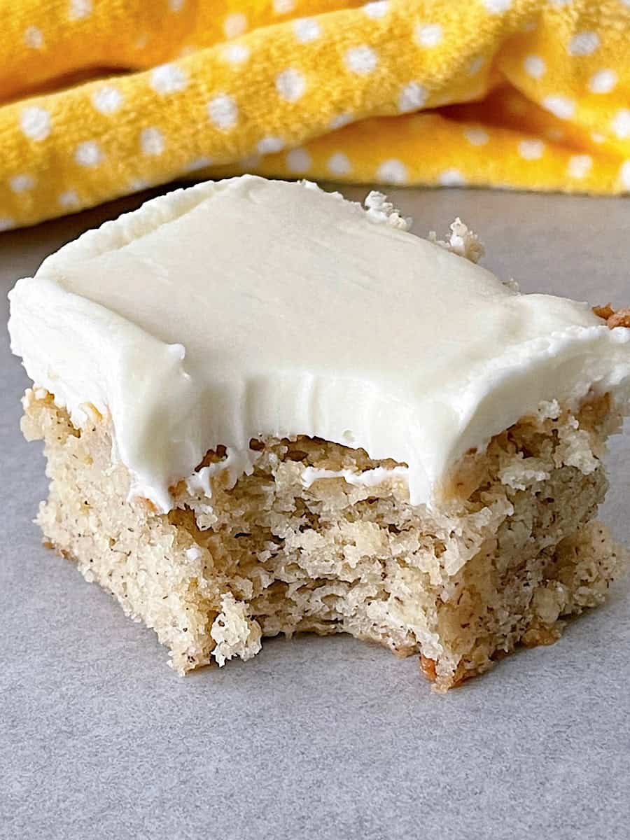 A banana bread bar with cream cheese frosting.