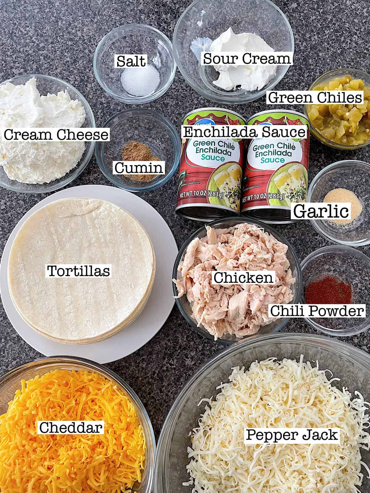 Ingredients to make stacked green chile chicken enchiladas.