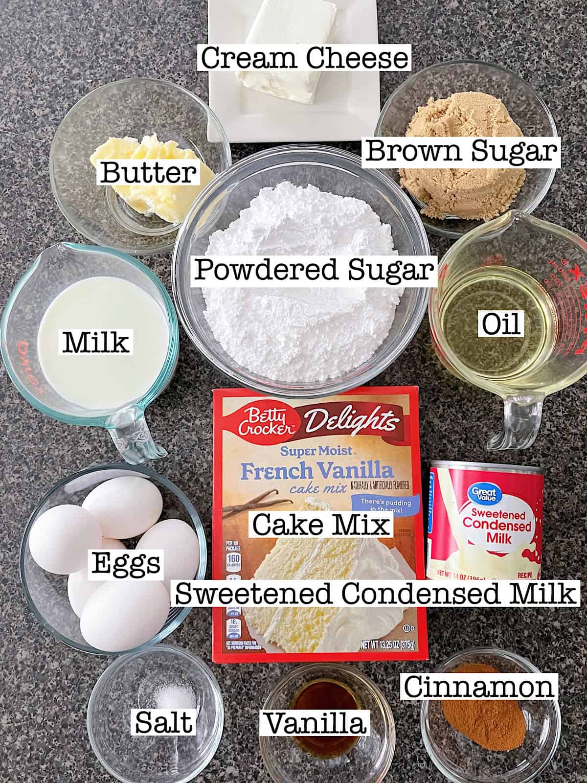 Ingredients to make Cinnamon Roll Poke Cake with cream cheese frosting.