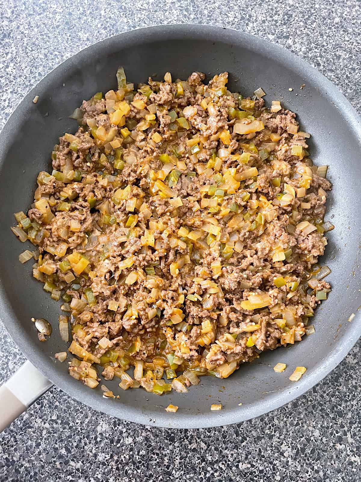 Cheesesteak Sloppy Joes in a large skillet.