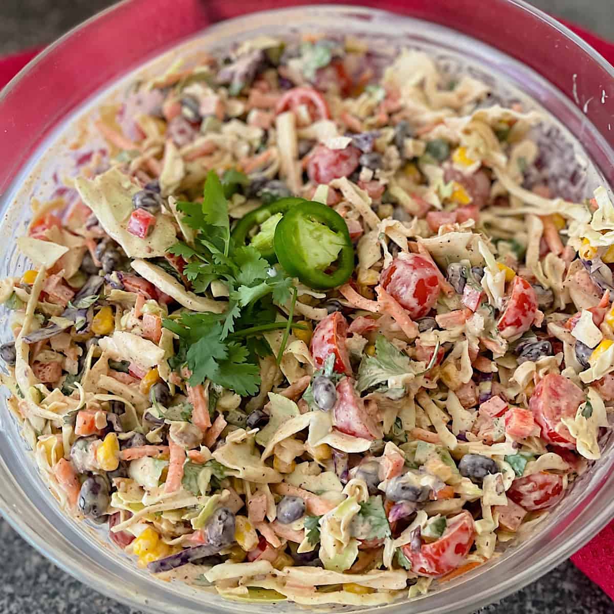 A clear bowl of Mexican coleslaw.
