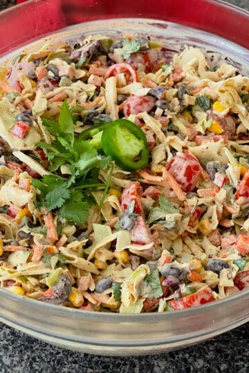 A clear bowl of Mexican coleslaw.