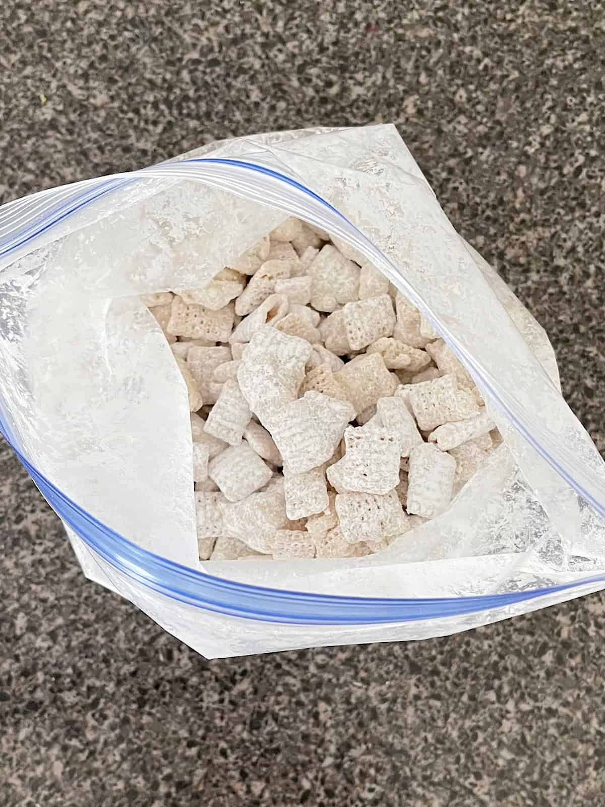 Lemon Pie Muddy Buddies in a ziplock bag.