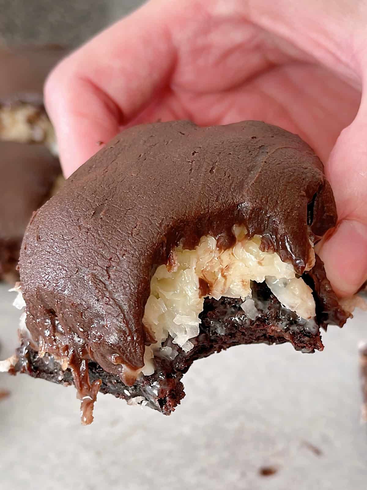 A Mounds Brownie with creamy coconut and dark chocolate frosting.