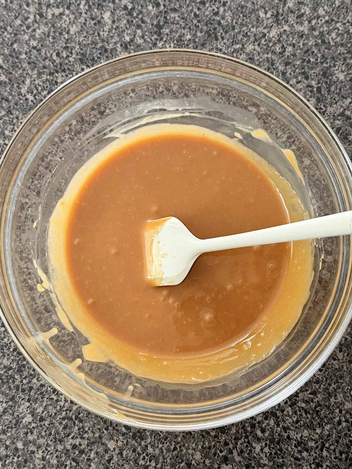 Melted caramel in a mixing bowl.